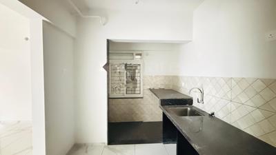 Kitchen Image of 910 Sq.ft 2 BHK Apartment / Flat for sale in Rahul Downtown, Punawale Pune for Rs. 10000025