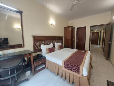 Bedroom Image of Urbanroomz Girls PG Nearby Dlf Cyberhub in DLF Phase 2, Gurgaon