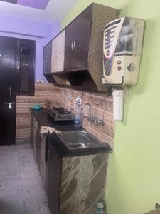 Kitchen Image of 320 Sq.ft 1 BHK Builder Floor for rent in Shalimar Bagh New Delhi for Rs. 20000