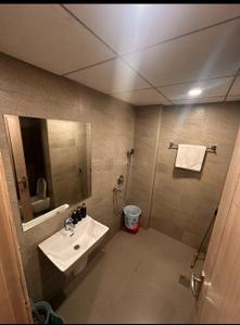 Bathroom Image of 451 Sq.ft 1 RK Apartment / Flat for rent in Paramount Pine And Oak Studio, Surajpur Greater Noida for Rs. 13500