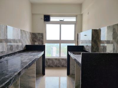 Kitchen Image of 904 Sq.ft 2 BHK Apartment / Flat for rent in Dynamix Divum, Malad East Mumbai for Rs. 65000