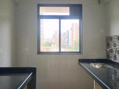 Kitchen Image of 715 Sq.ft 1 BHK Apartment / Flat for sale in Charms Global City, Ambernath East Ambernath for Rs. 3100000