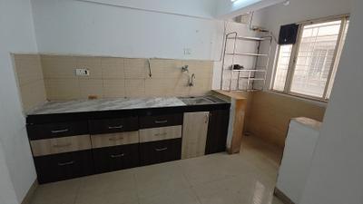 Kitchen Image of 980 Sq.ft 2 BHK Apartment / Flat for sale in Pride Aashiyana, Lohegaon Pune for Rs. 6200000