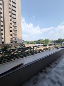 Balcony Image of 824 Sq.ft 3 BHK Apartment / Flat for sale in Ashwamegh Elite, Sargasan Gandhinagar for Rs. 7900000