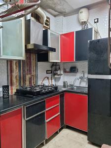 Kitchen Image of 1200 Sq.ft 2 BHK Builder Floor for rent in Janakpuri New Delhi for Rs. 26000