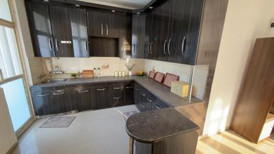 Kitchen Image of 1400 Sq.ft 2.5 BHK Apartment / Flat for sale in Kingswood Court, Crossings Republik Ghaziabad for Rs. 10200000
