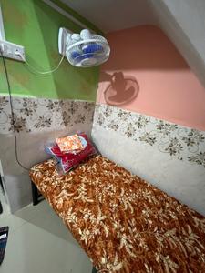 Bedroom Image of Thakur &amp; om sai Paying Guest  in Ghansoli, Navi Mumbai