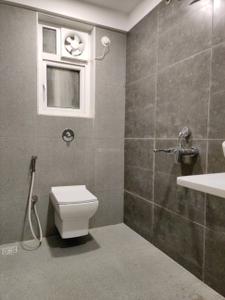 Common Bathroom Image of 1280 Sq.ft 2 BHK Apartment / Flat for sale in Omkar Meridia, Kurla West Mumbai for Rs. 18888888