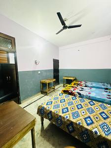 Bedroom Image of Laxmi boys pg  in Ansal Golf Links 1, Greater Noida