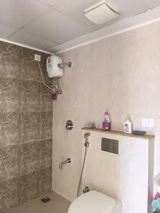 Common Bathroom Image of 927 Sq.ft 2 BHK Apartment / Flat for sale in Lodha Palava Downtown, Palava Phase 2 Thane for Rs. 5000000