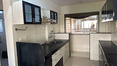 Kitchen Image of 867 Sq.ft 2 BHK Apartment / Flat for rent in Sonigara Nilay, Chinchwad Pune for Rs. 31000