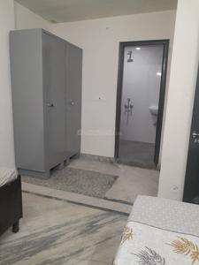 Bedroom Image of Saxena pg in Sector 27, Noida