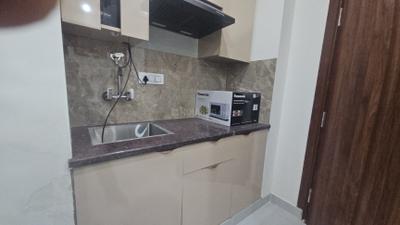 Kitchen Image of 550 Sq.ft 1 BHK Builder Floor for rent in Sector 39 Gurgaon for Rs. 30000