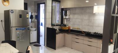 Kitchen Image of 1350 Sq.ft 2 BHK Apartment / Flat for sale in Dhanush Buildcon Canal Walk Shoppers Sanctum Celino, Vesu Surat for Rs. 5500000