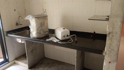 Kitchen Image of 700 Sq.ft 1 BHK Apartment / Flat for rent in Platinum Silver Classic, Kalamboli Navi Mumbai for Rs. 18000