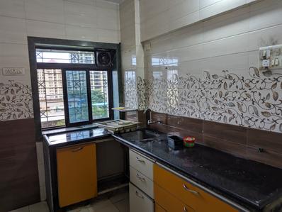 Kitchen Image of 650 Sq.ft 1 BHK Apartment / Flat for rent in Anand Vastu Anand, Kalwa Thane for Rs. 20000