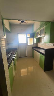 Kitchen Image of 585 Sq.ft 1 BHK Apartment / Flat for rent in Cosmos Jewels, Thane West Thane for Rs. 25000