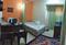 Eemmar Gurgaon Green Bedroom 1