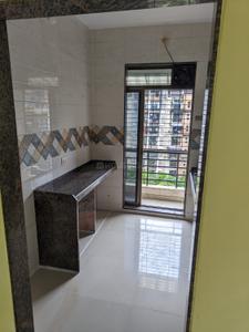 Kitchen Image of 670 Sq.ft 1 BHK Apartment / Flat for sale in Thakurli Thane for Rs. 4700000