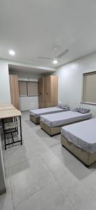 Bedroom Image of Garuda boys hostel Erandwne nalstop metro station near sndt college karve road in Kothrud, Pune