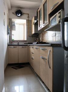 Kitchen Image of 935 Sq.ft 2 BHK Apartment / Flat for rent in CGHS Rail Vihar, Sector 15 Gurgaon for Rs. 35000
