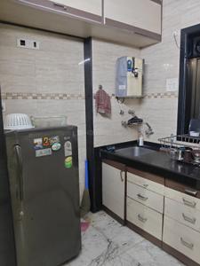 Kitchen Image of 595 Sq.ft 1 BHK Apartment / Flat for rent in Sanpada Navi Mumbai for Rs. 38000