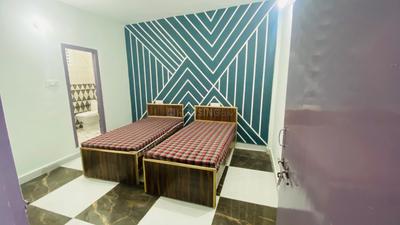 Bedroom Image of Raj pg in Sector 22, Noida