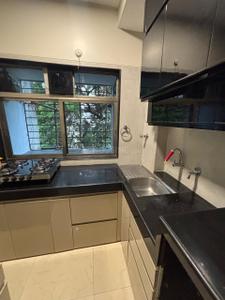 Kitchen Image of 1150 Sq.ft 3 BHK Apartment / Flat for rent in Skyline Poseidon, Andheri West Mumbai for Rs. 130000