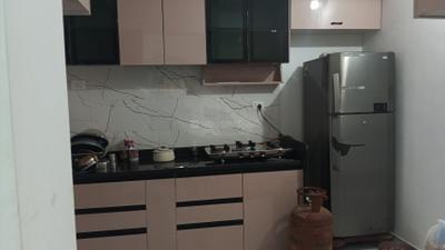 Kitchen Image of 750 Sq.ft 2 BHK Apartment / Flat for rent in Krupasindhu Town Square, Charholi Budruk Pune for Rs. 18000