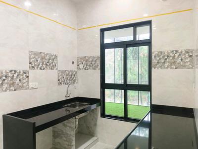 Kitchen Image of 650 Sq.ft 1 BHK Apartment / Flat for sale in Venus Skky City by Venus Nirvana LLP, Sandap Gaon Thane for Rs. 4251000