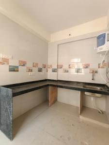 Kitchen Image of 950 Sq.ft 2 BHK Apartment / Flat for rent in Krushna Kunj, Taloja Navi Mumbai for Rs. 10000