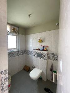Bathroom Image of 670 Sq.ft 2 BHK Apartment / Flat for sale in Krish City Phase 1, Tapukara Bhiwadi for Rs. 1300000