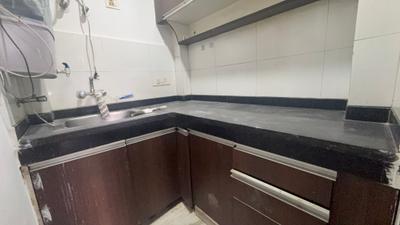 Kitchen Image of 700 Sq.ft 1 BHK Builder Floor for rent in Sector 57 Gurgaon for Rs. 20000
