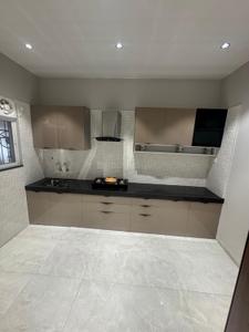 Kitchen Image of 950 Sq.ft 2 BHK Apartment / Flat for sale in Charholi Budruk Pune for Rs. 5700000