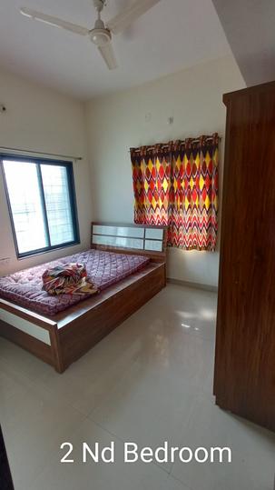 Dyaneshwari Apartment Bedroom 1
