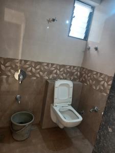 Bathroom Image of 709 Sq.ft 2 BHK Apartment / Flat for sale in Varun Ratnam Glorious, Mavdi Rajkot for Rs. 3600000