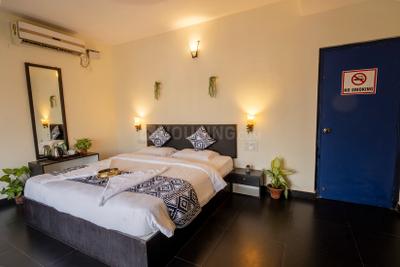 Bedroom Image of HelloWorld Riverbankinn in Morjim, Goa