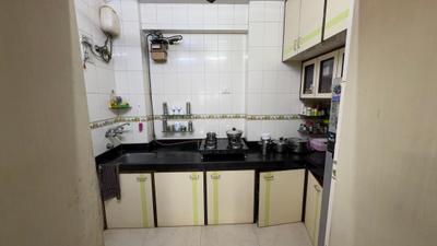 Kitchen Image of 1066 Sq.ft 2 BHK Apartment / Flat for sale in Eden Woods Complex, Thane West Thane for Rs. 19000000
