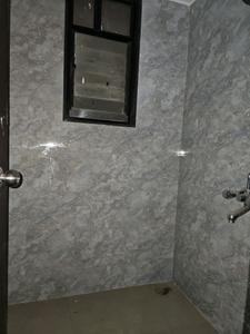 Common Bathroom One Image of 600 Sq.ft 1 BHK Apartment / Flat for sale in Dreams Lynnea A B Wings, Wagholi Pune for Rs. 3580000