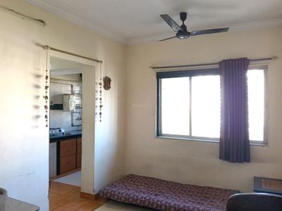 Living Room Image of 600 Sq.ft 1 BHK Apartment / Flat for rent in Puraniks Kanchan Pushp Society, Hiranandani Estate Thane for Rs. 18000