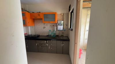 Kitchen Image of 570 Sq.ft 1 BHK Apartment / Flat for sale in Windsor Swapna Sankul, Lohegaon Pune for Rs. 4100000