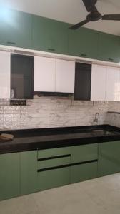Kitchen Image of 850 Sq.ft 2 BHK Apartment / Flat for rent in AUM Miravet District Phase I, Ravet Pune for Rs. 24000