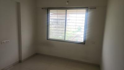 Living Room Image of 634 Sq.ft 1 BHK Apartment / Flat for sale in GT Mangal Vishwa, Vikas Nagar Pune for Rs. 4700000