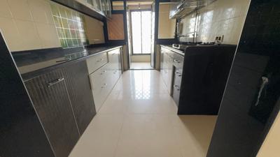 Kitchen Image of 900 Sq.ft 2 BHK Apartment / Flat for rent in Kulswamini Goraksha Dham, Borivali East Mumbai for Rs. 50000