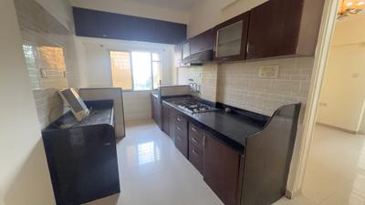Kitchen Image of 910 Sq.ft 2 BHK Apartment / Flat for rent in GK Dwarka Sun Crest Phase 3, Rahatani Pune for Rs. 28000