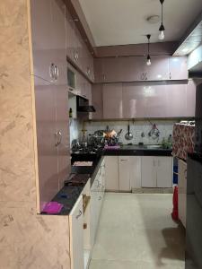 Kitchen Image of 1100 Sq.ft 2 BHK Apartment / Flat for rent in Aditya City Apartment Ghaziabad, Wave City Ghaziabad for Rs. 18000