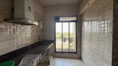 Kitchen Image of 700 Sq.ft 1 BHK Apartment / Flat for sale in Paradise Sai Harmony, Ulwe Navi Mumbai for Rs. 6000000