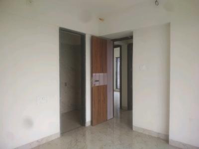 Bedroom Image of 910 Sq.ft 3 BHK Apartment / Flat for sale in Tharwani Vedant Millenia, Titwala Thane for Rs. 6100000