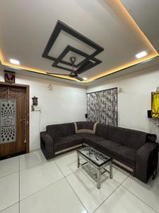 Living Room Image of 900 Sq.ft 3 BHK Apartment / Flat for sale in Madhapar Rajkot for Rs. 5600000