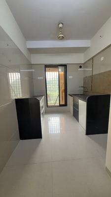 Kitchen Image of 850 Sq.ft 2 BHK Apartment / Flat for rent in Unique Greens Building A C And D, Thane West Thane for Rs. 31000